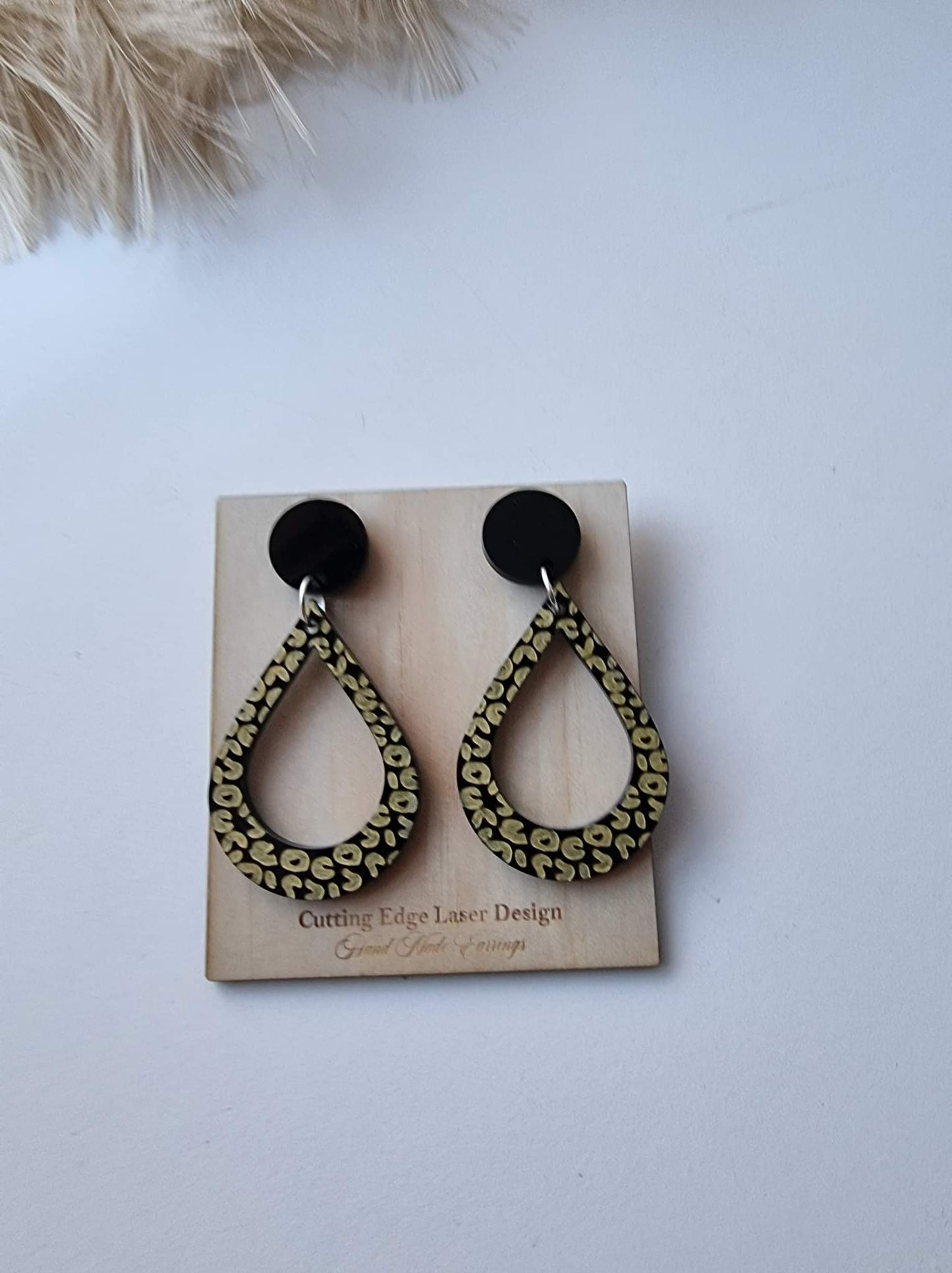 Earring "Gold infill leopard print tear drop."