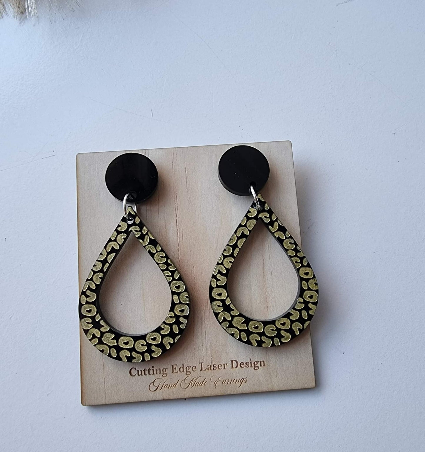 Earring "Gold infill leopard print tear drop."