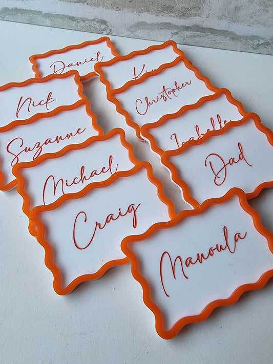 Wavy bordered name plaques