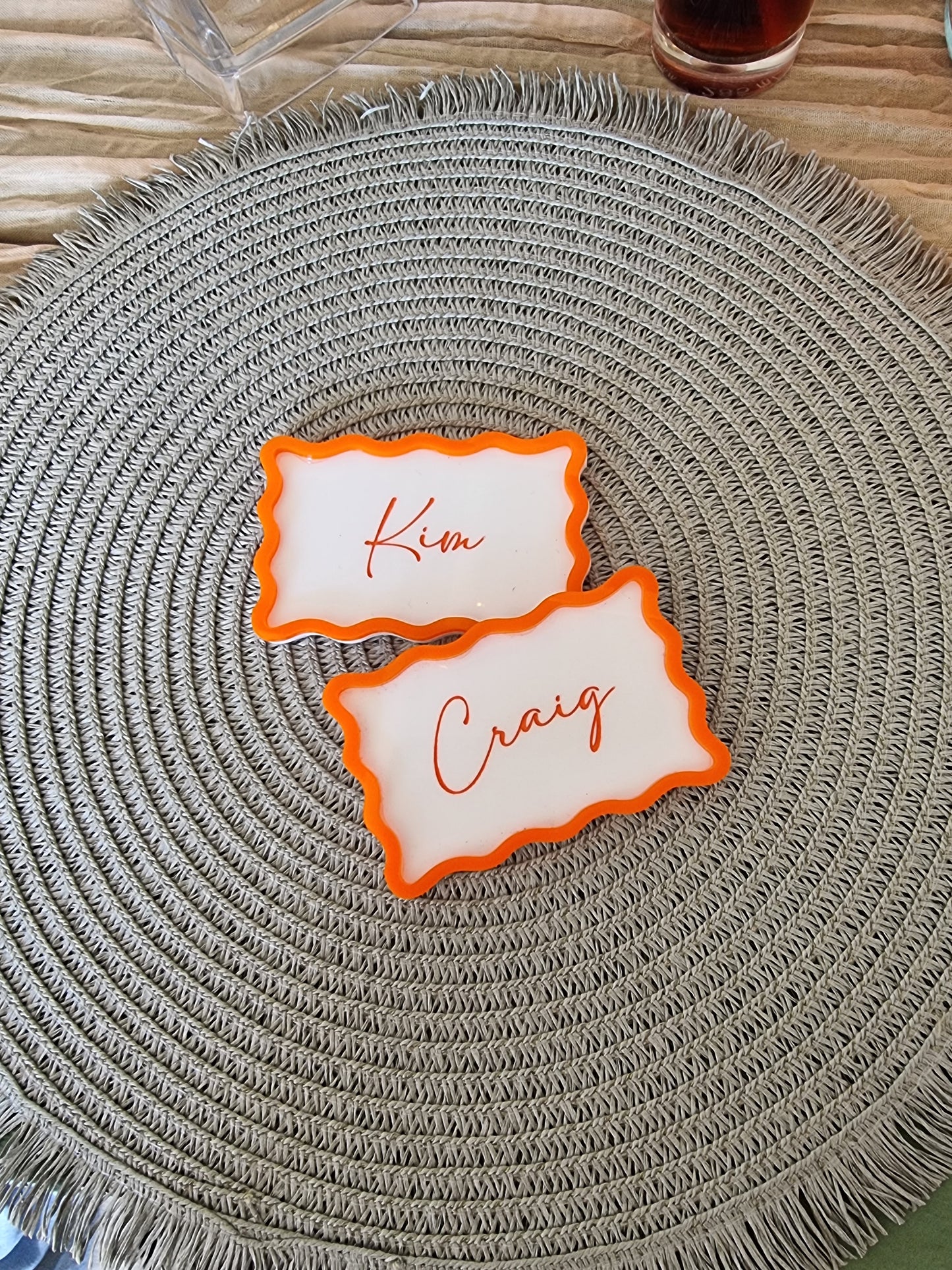 Wavy bordered name plaques